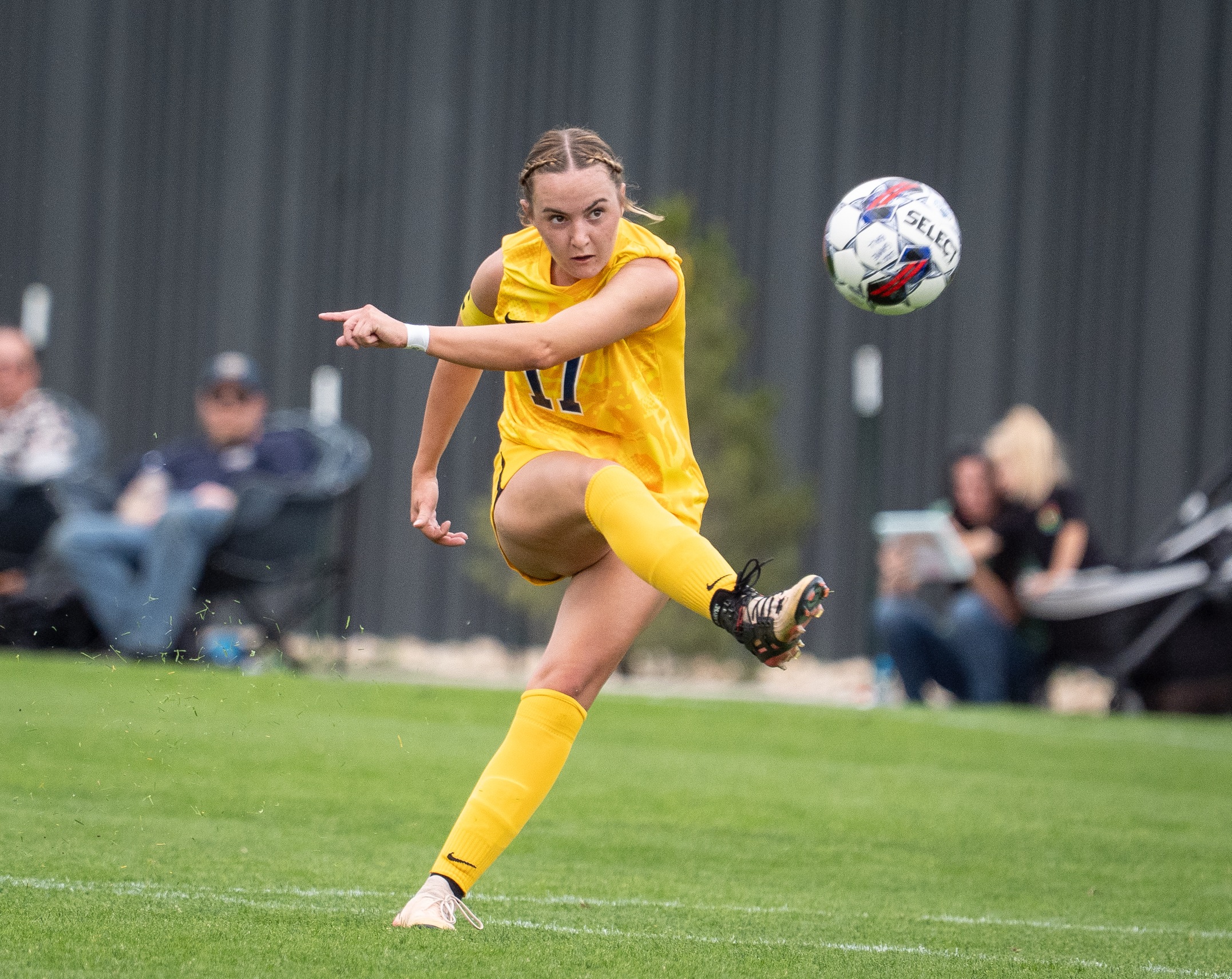 Jentrie Porter kicking a soccer ball