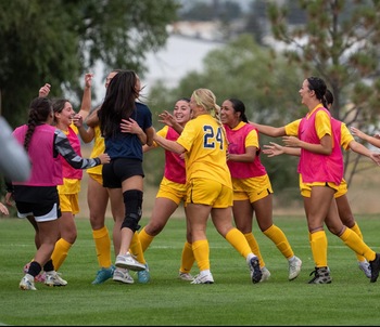 Golden Eagle Women’s Soccer celebrating after scoring a goal
